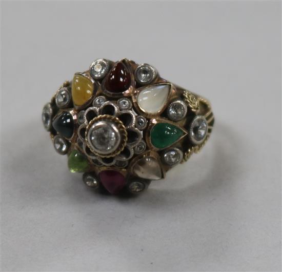 An Indian? 14ct gold and multi gem set dome topped ring, size L.